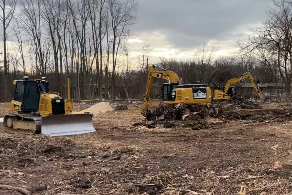 Construction Site With Excavators Clearing Land